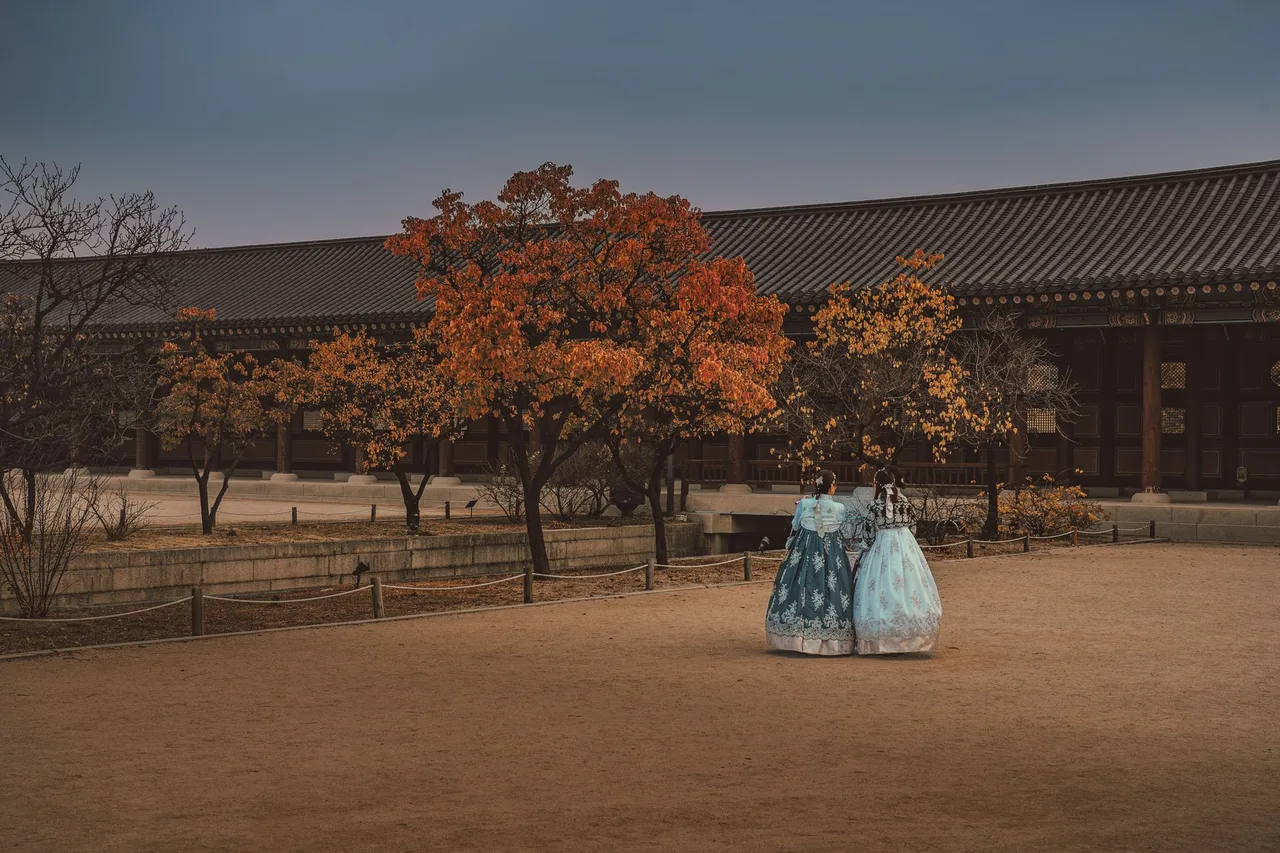 Visitors in colorful hanbok at a Seoul palace